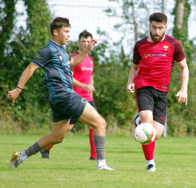 Greg Brown competes for possession against St Ishmaels. Picture Gordon Thomas